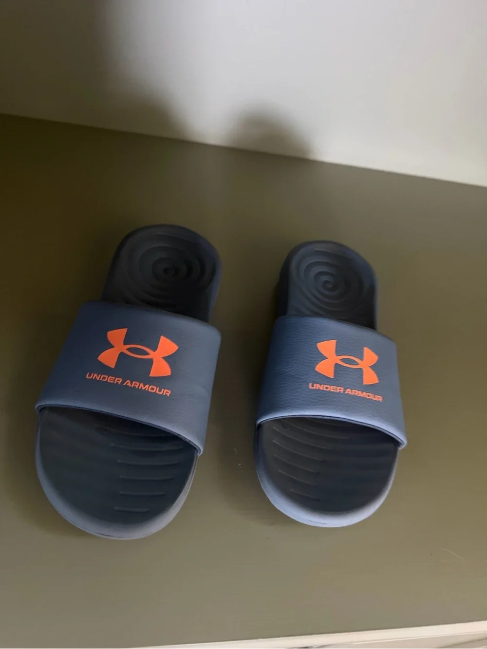 Under Armour Navy Slides with Orange Logo Accents